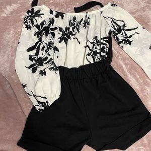 Black and white romper only used once